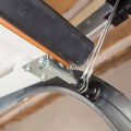 Do garage door tracks wear out?