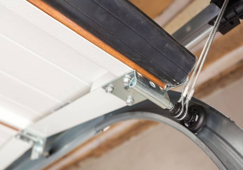 Do garage door tracks wear out?